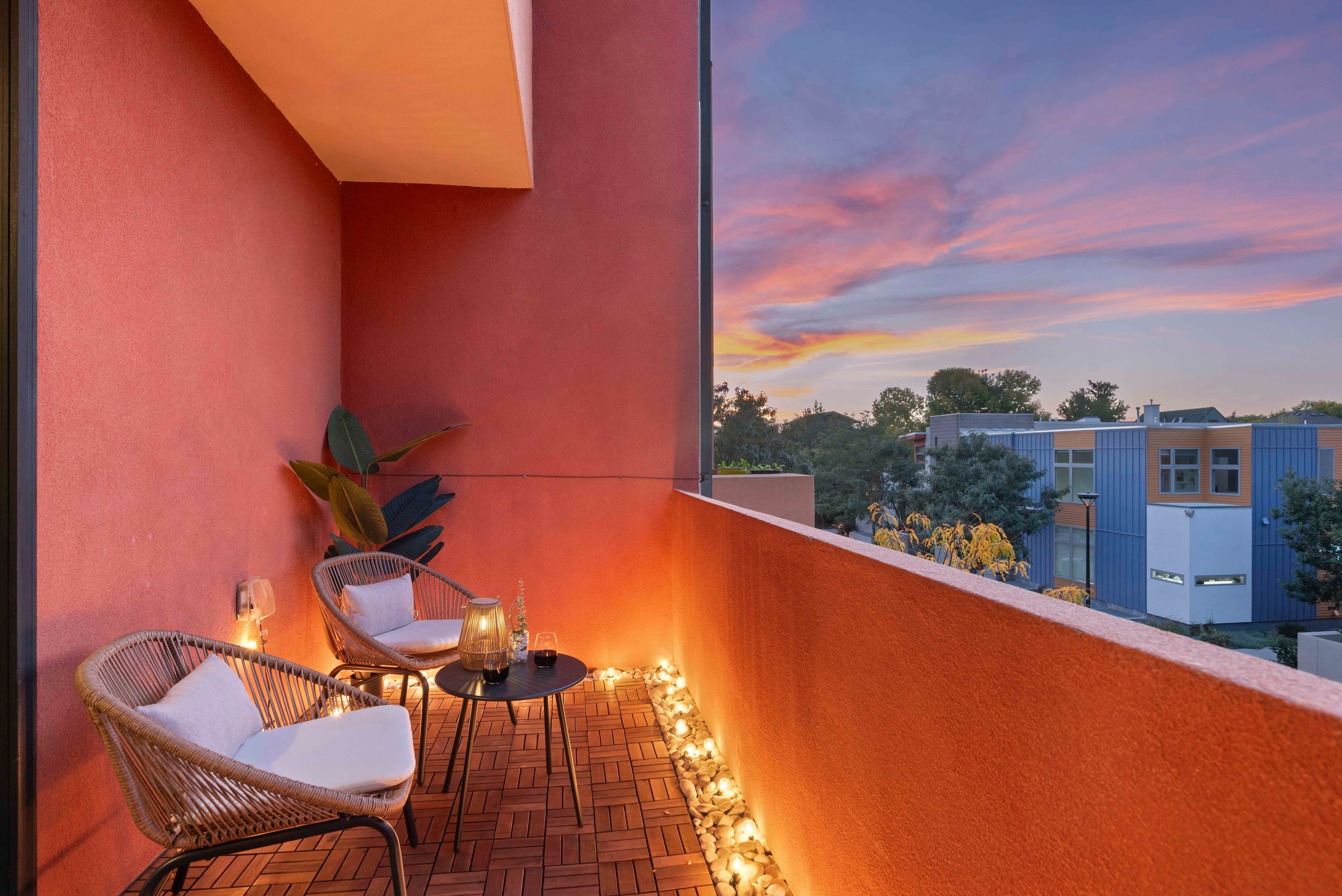 The Treehouse Oasis in Longmont, Colorado — balcony overlooking sunset over the Rocky Mountain foothills